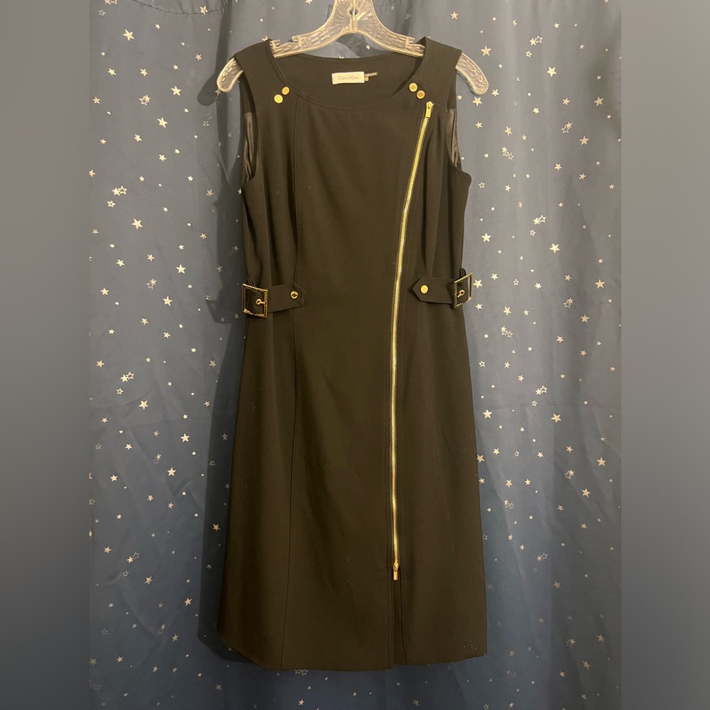 Beautiful black dress looks very modern/formal